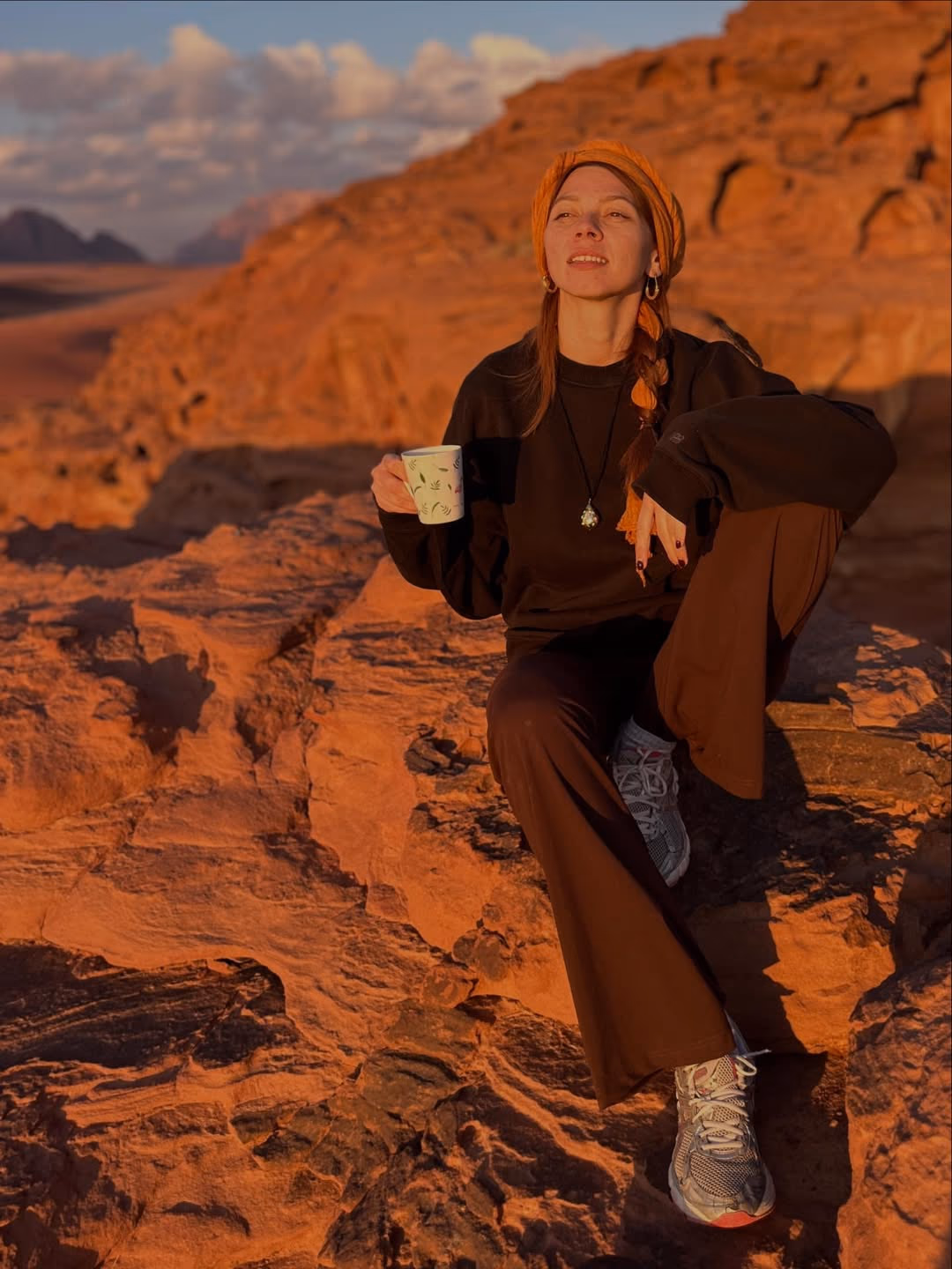 Wadi Rum desert landscape at golden hour with dramatic sandstone formations